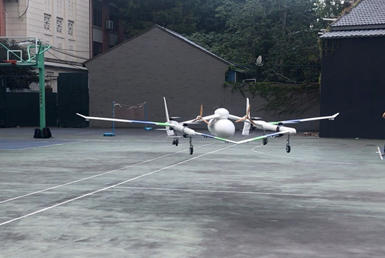 Tian Gong cargo drone hovering, rear view Tian Gong cargo drone hovering, rear view